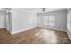 Bedroom with hardwood floors and large window at 807 Lauras Ln, Albemarle, NC 28001