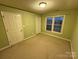 Spacious bedroom with neutral walls and carpet at 100 Southern Pines Dr, Shelby, NC 28152