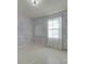 Bedroom with purple walls, window, and simple flooring at 28403 Hatley Farm Rd, Albemarle, NC 28001