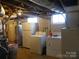 Unfinished basement with laundry hookups and ample storage space at 325 Hunter St, Salisbury, NC 28144