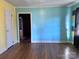 Spacious bedroom with hardwood floors and two-toned walls at 325 Hunter St, Salisbury, NC 28144