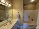 Bathroom with tub, shower, and vanity with mirror at 6006 Village Nw Dr, Concord, NC 28027