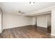 Spacious living room with wood-look flooring and ceiling fan at 1284 Ebenezer Rd, Rock Hill, SC 29732