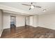 Living room with hardwood floors, ceiling fan, and neutral-toned walls at 1284 Ebenezer Rd, Rock Hill, SC 29732