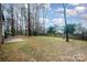 Large backyard with wooded area and privacy fence at 14637 S Brent Dr, Huntersville, NC 28078