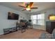 Bedroom with desk setup, two monitors, and ceiling fan at 2004 Oakbriar Cir, Indian Trail, NC 28079