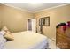 Bedroom with king-size bed, dresser, and mirror at 1115 Marys Grove Church Rd # 1, Kings Mountain, NC 28086