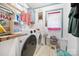 Bright laundry room, washer, dryer, and storage at 1115 Marys Grove Church Rd # 1, Kings Mountain, NC 28086