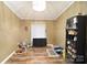 Living room with hardwood floors and toy storage at 1115 Marys Grove Church Rd # 1, Kings Mountain, NC 28086