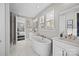 Elegant bathroom featuring a freestanding tub, double sinks, and a walk-in shower at 112 Tallow Ct, Mooresville, NC 28117