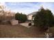 Home with fenced backyard, patio, shed, and mature trees at 13019 Lake Erie Ln, Charlotte, NC 28273