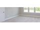 Bedroom with a door and large window at 169 Wylie Trl, Statesville, NC 28677