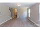 Spacious living room with hardwood floors and lots of natural light at 169 Wylie Trl, Statesville, NC 28677