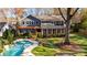 House with pool and pergola, showcasing backyard oasis at 1818 Wandering Way Dr, Charlotte, NC 28226