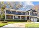 Two-story gray house with white trim and a two-car garage at 1818 Wandering Way Dr, Charlotte, NC 28226