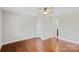 Bedroom with hardwood floors, ceiling fan, and closet at 2505 Ashford Dr, Newton, NC 28658