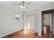 Bedroom with hardwood floors, an open closet, and ceiling fan at 2505 Ashford Dr, Newton, NC 28658