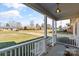 Inviting covered front porch offering a view of the neighborhood and a place to relax at 2505 Ashford Dr, Newton, NC 28658