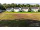 Row of new homes with backyard green space at 630 Smith St # B, Mooresville, NC 28115