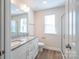 Bathroom boasts double vanity, granite countertop and a walk-in shower at 630 Smith St # B, Mooresville, NC 28115