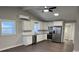 Modern kitchen with white cabinets and stainless steel appliances at 7327 Millersville Rd, Taylorsville, NC 28681