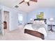 Spacious bedroom with carpeted floors and ceiling fan at 8717 Sedgeburn Dr, Charlotte, NC 28278