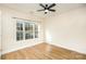 Bright bedroom featuring a large window and ceiling fan at 9315 Meadow Vista Rd, Charlotte, NC 28213