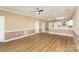 Open living room with hardwood floors and kitchen view at 9315 Meadow Vista Rd, Charlotte, NC 28213