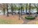 Residential community with mature trees and a walkway at 10125 Westmoreland Rd # 1D, Cornelius, NC 28031