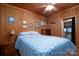 Bright bedroom with a double bed and a dresser at 108 Fathom Trl # 178, Mount Gilead, NC 27306
