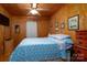 Bedroom with double bed, ceiling fan, and dresser at 108 Fathom Trl # 178, Mount Gilead, NC 27306