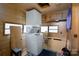 Compact laundry room with stacked washer and dryer at 108 Fathom Trl # 178, Mount Gilead, NC 27306