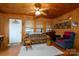 Cozy living room with wood paneling and a comfy couch at 108 Fathom Trl # 178, Mount Gilead, NC 27306