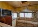 Cozy living room with sofa and wood paneling at 108 Fathom Trl # 178, Mount Gilead, NC 27306