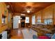 Living area with wood-paneled walls, couch, and a TV at 108 Fathom Trl # 178, Mount Gilead, NC 27306