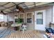 Covered porch with ceiling fan, seating, and a table at 108 Fathom Trl # 178, Mount Gilead, NC 27306