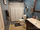 Clean bathroom with shower, toilet and vanity at 1663 Golden Cedar Ln, Newton, NC 28658