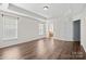 Bedroom featuring hardwood floors and ensuite bathroom at 2299 Elendil Ln, Charlotte, NC 28269