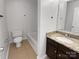 Bathroom with granite countertop vanity, bathtub, and tile flooring at 4438 Cochran Farm Ln, Charlotte, NC 28269