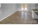 Dining area with hardwood floors and access to the backyard at 4438 Cochran Farm Ln, Charlotte, NC 28269