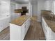 Kitchen with white cabinets, granite countertops and island at 4438 Cochran Farm Ln, Charlotte, NC 28269
