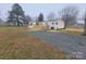 Mobile home with gravel driveway and deck at 472 Buffalo Shoals Rd, Lincolnton, NC 28092