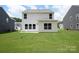 Backyard view of home and grassy area at 1009 20Th Avenue Se Loop, Hickory, NC 28602