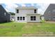 Backyard view of home and grassy area at 1009 20Th Avenue Se Loop, Hickory, NC 28602