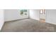 Spacious bedroom with carpet and access to bathroom at 1009 20Th Avenue Se Loop, Hickory, NC 28602