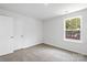 Well-lit bedroom with carpet and neutral color palette at 1009 20Th Avenue Se Loop, Hickory, NC 28602