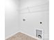 Laundry room with tile floor and hookups for washer/dryer at 1009 20Th Avenue Se Loop, Hickory, NC 28602