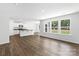 Bright and spacious living area with hardwood floors and large windows at 1009 20Th Avenue Se Loop, Hickory, NC 28602
