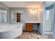 Bathroom with corner tub, vanity, and shower at 2124 Mcbrayer Springs Rd, Shelby, NC 28150