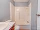 Clean bathroom with a tub shower combo and wood vanity at 2124 Mcbrayer Springs Rd, Shelby, NC 28150